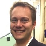 Alex Crown smiling for the camera