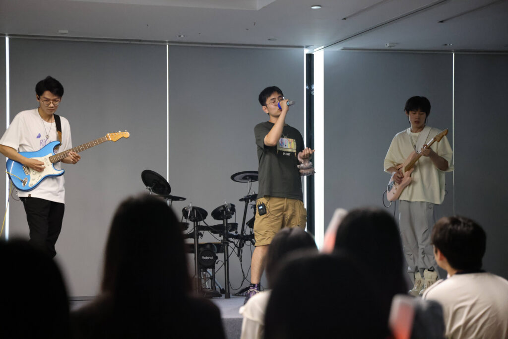 a group of people standing in a room
