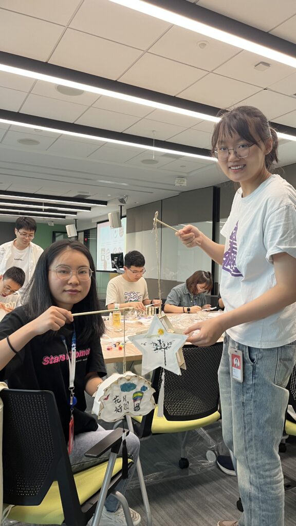 a group of people standing in a room