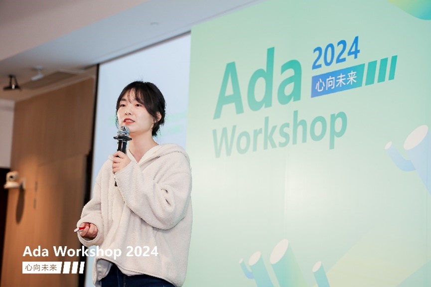 a woman giving a talk