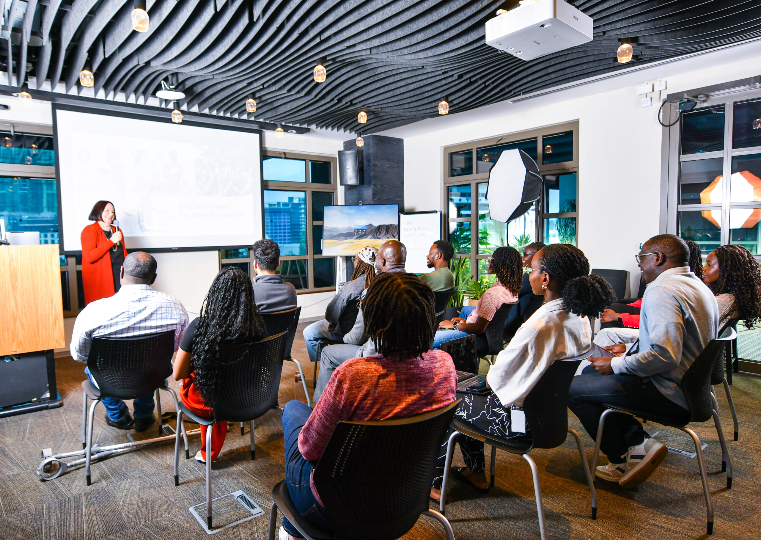 a person giving a presentation to a group of people