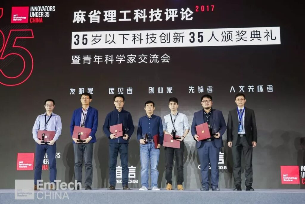 a group of people posing for the camera