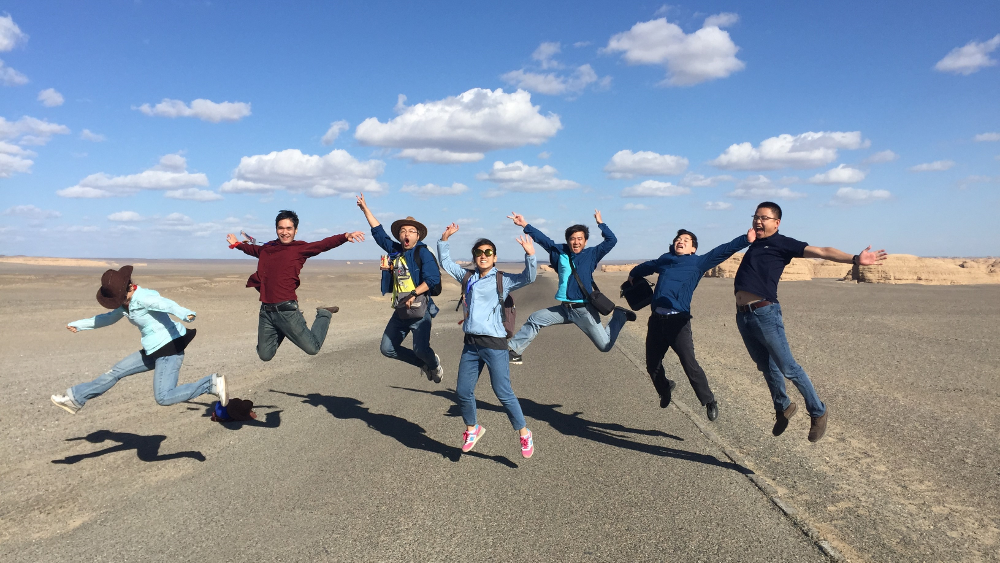 a group of people on a beach