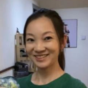 a woman smiling for the camera