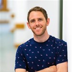 a man in a blue shirt