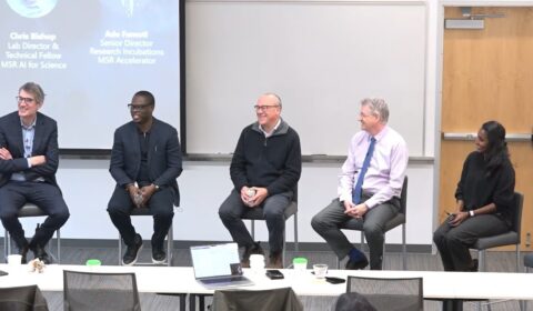 a group of people sitting in chairs