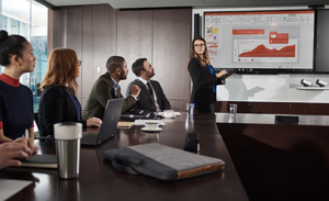 Image of a meeting taking place in a meeting room.