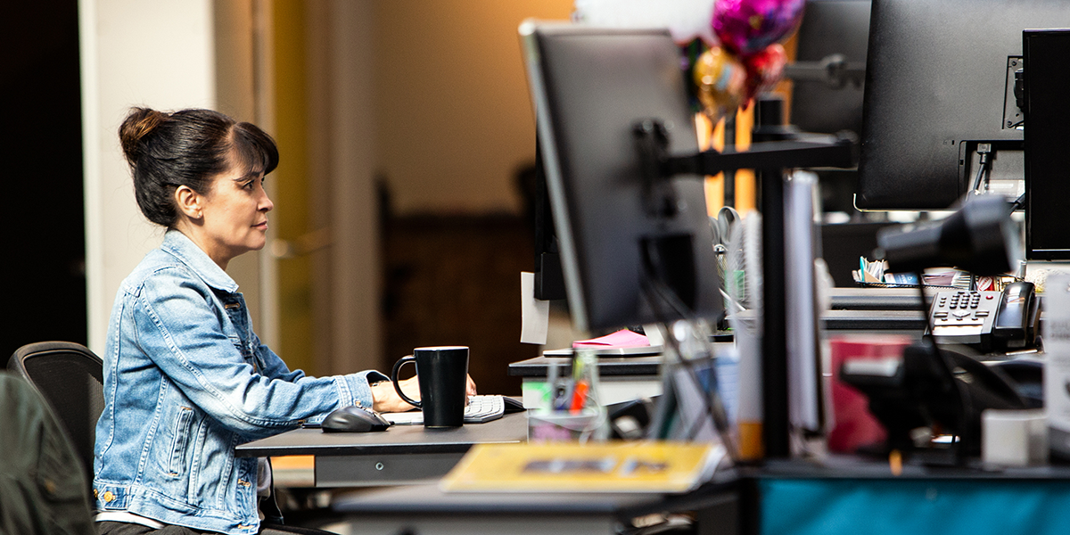 Image of a security worker in her office.