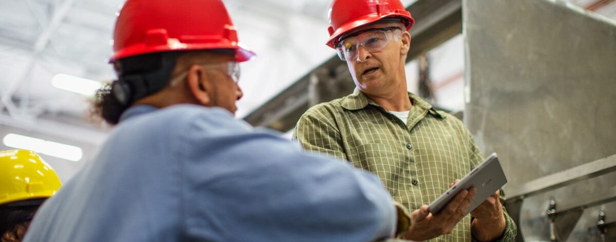 Operations manager meets with a shop foreman.