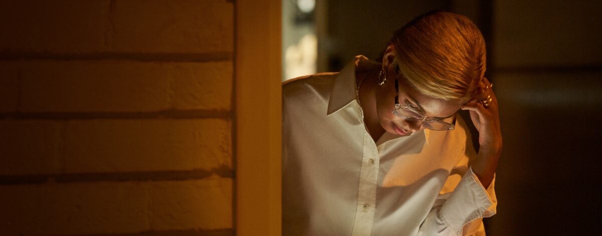 Retail store manager using a tablet securely while working remote from a café.