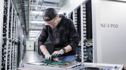Datacenter service technician working on server rack