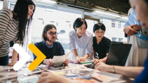 Group of people are working together in a modern working space in Tokyo.