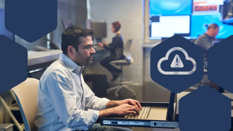 Photo of a SOC analyst working on a server