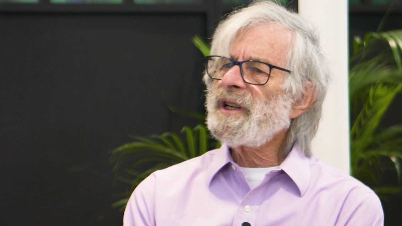 Leslie Lamport smiling for the camera