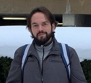 Photo of the author outdoors, looking at the camera.