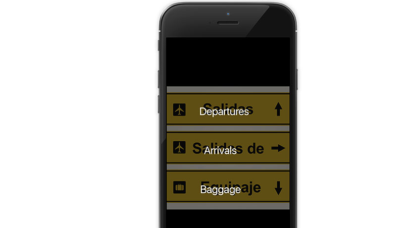 Translator app showing the image translation capability with the translated text overlaying the original Spanish text.