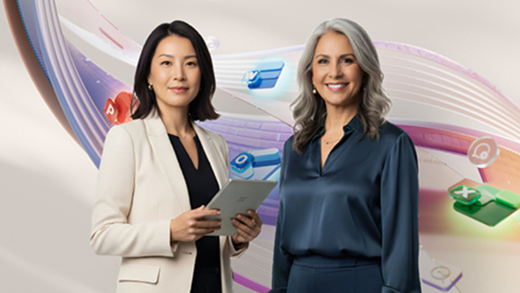Two business-dressed women, one holding a tablet, smile in front of an abstract background with colorful app icons.