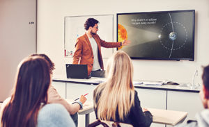 Image of a presenter giving a presentation in PowerPoint.