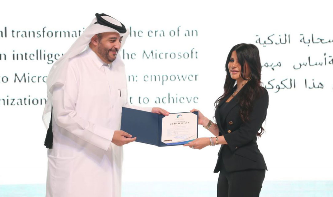 Lana Khalaf, Microsoft GM Qatar, receiving the NIA certificate from H.E. NCSA President.
