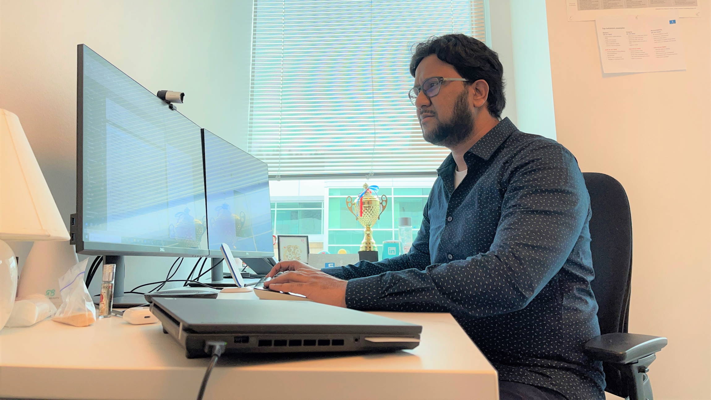 Azharuddin Mohammed works at his desk at his office at Microsoft.