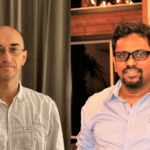 Trindev and Byreddy in separate photos joined together. Trindev is standing in front of a curtain and Byreddy is standing in his home.
