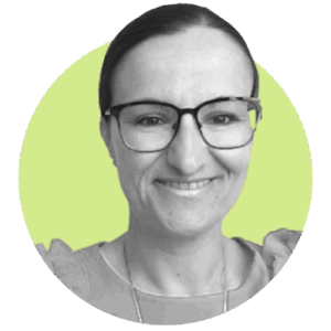 Cubino smiles as she stands in the Lisbon office.