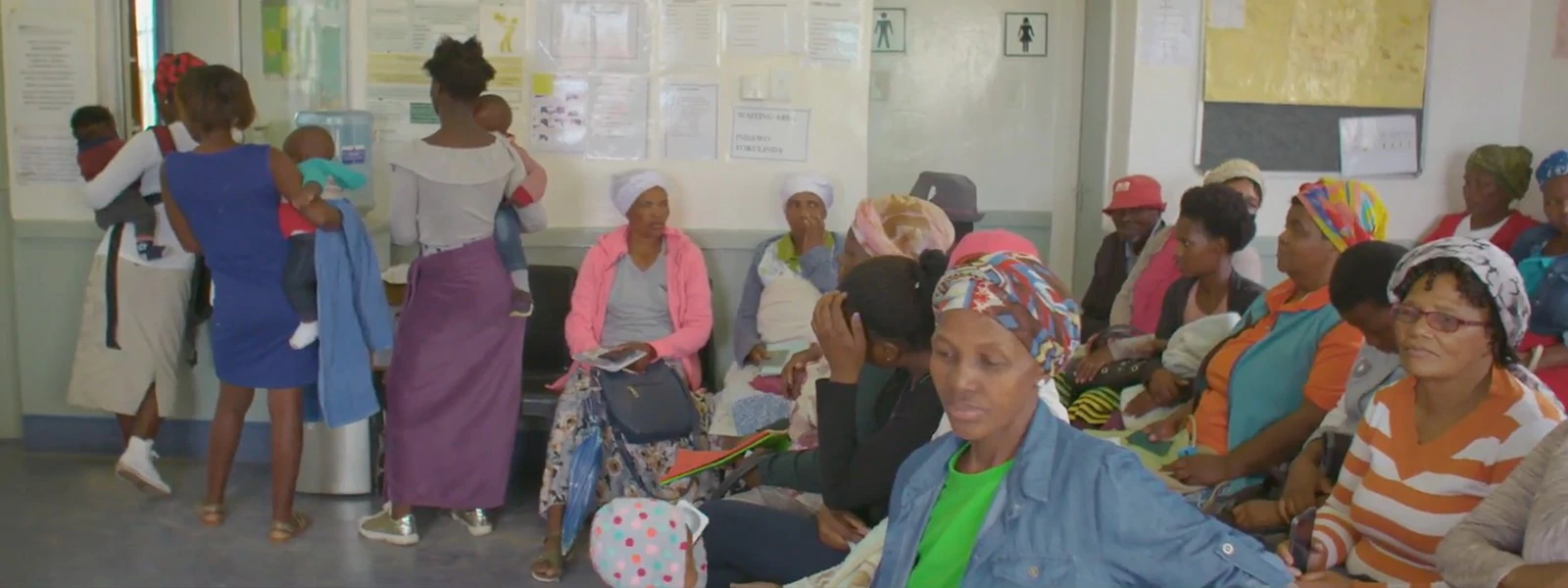 A group of women in South Africa in the waiting room of a healthcare center.