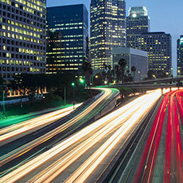 Highway lights blur to depict fast digital connection