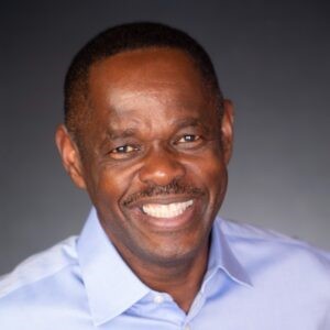 a close-up of a man smiling