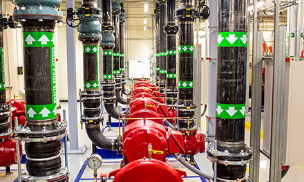 An image of a state-of-the-art facility uses eco-friendly solutions such as using reclaimed water to cool the data center.